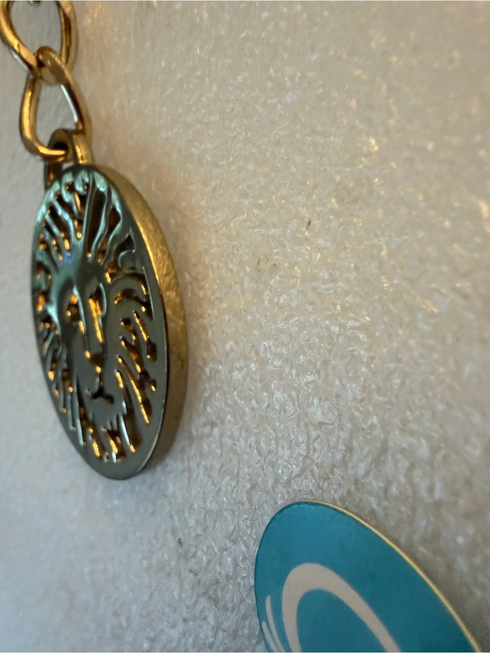 Anne Klein Gold Lion Medallion Keychain with Navy Accent